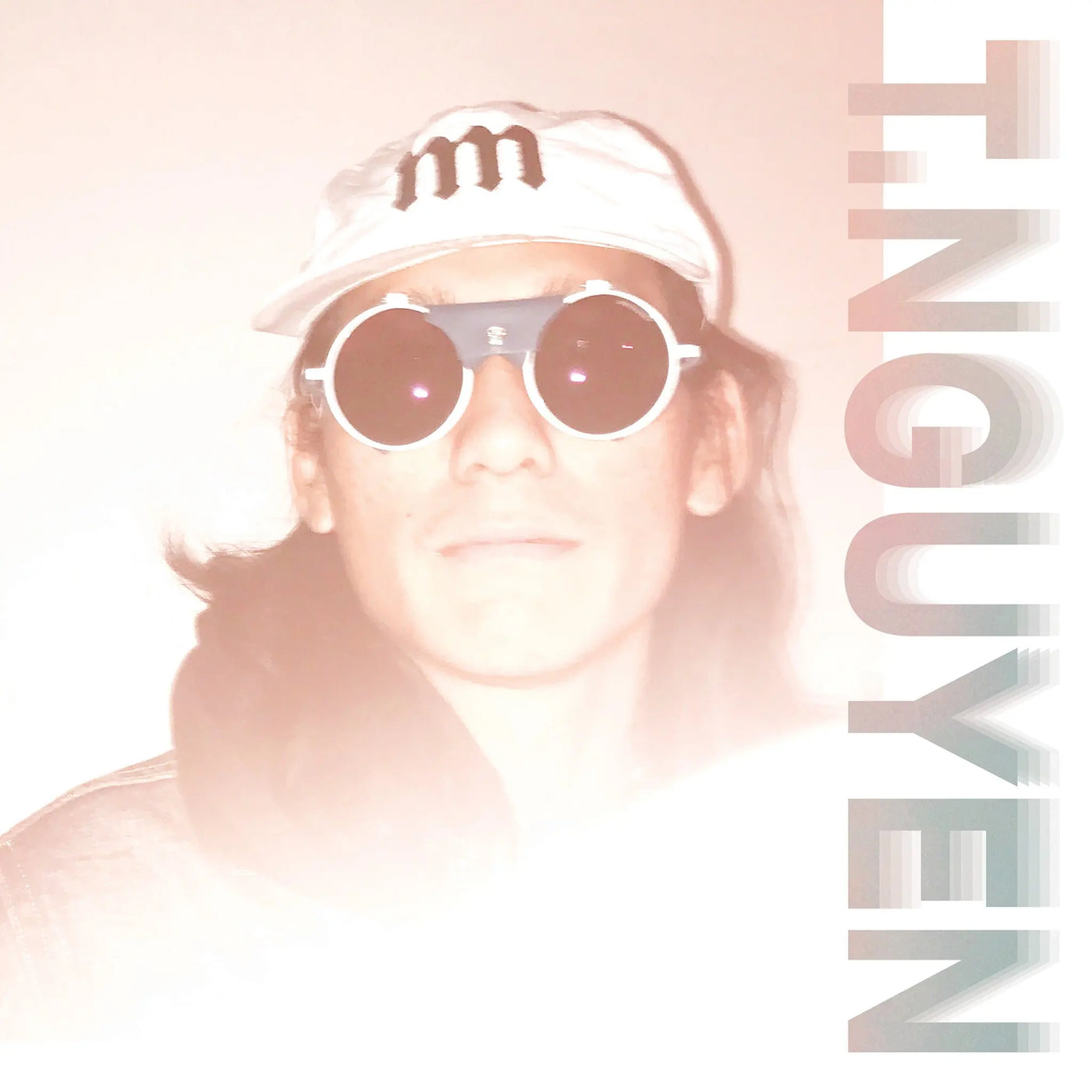 Person wearing a cap and sunglasses with T. Nguyen' text on a light pink background